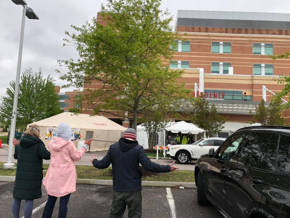 Group Prays Outside of Hospital for Health Care Workers and Patients